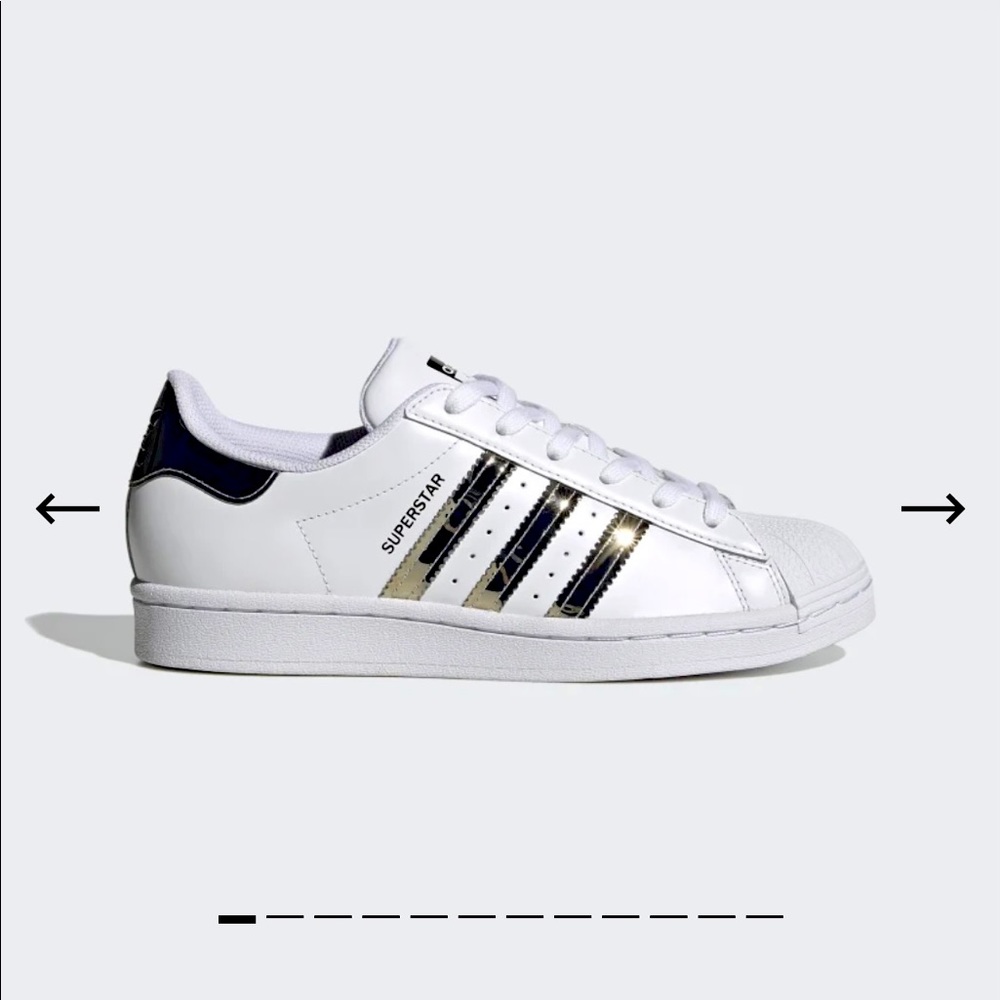 Adidas Superstar with Metallic platinum stripes.